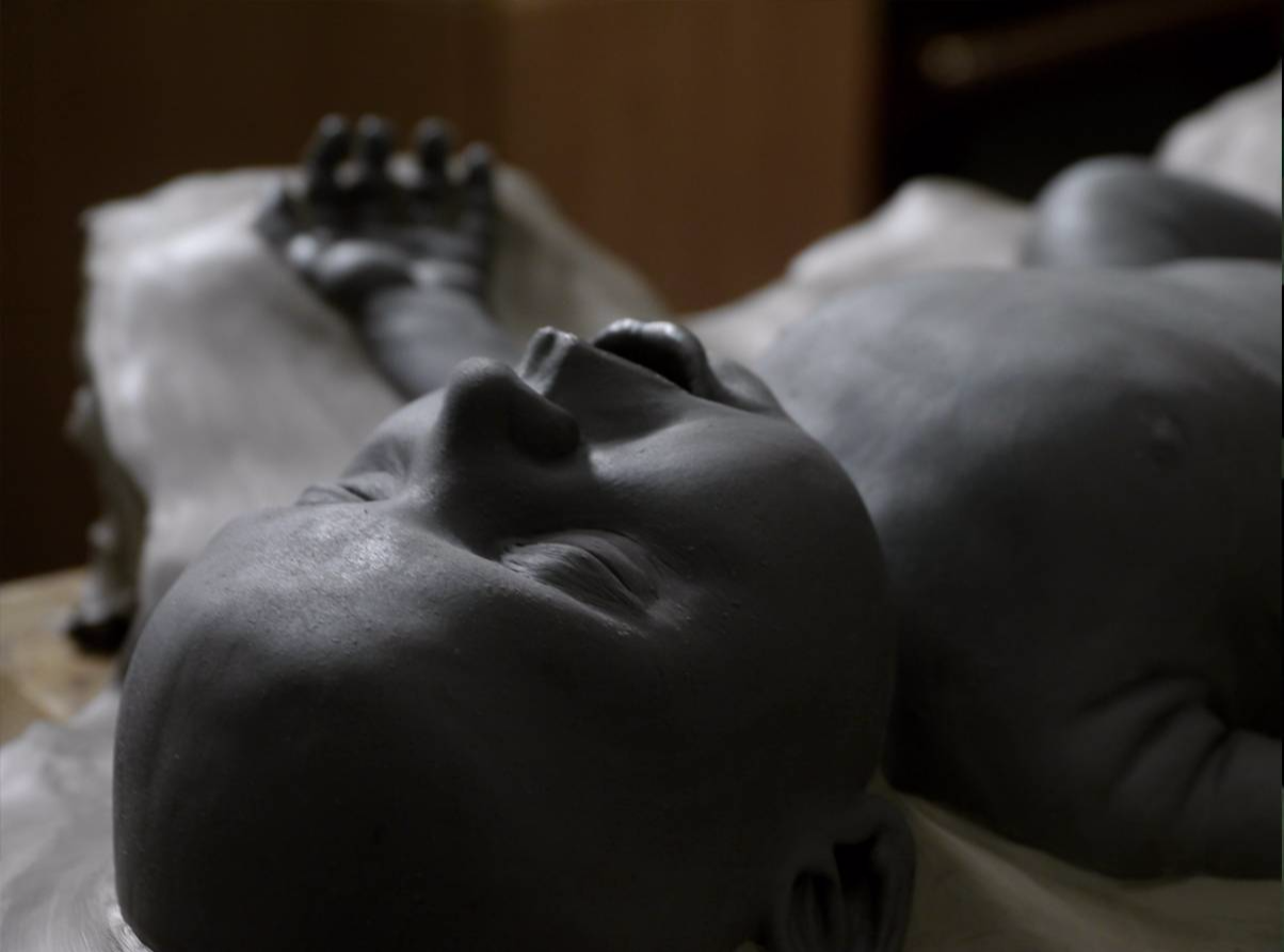 clay baby sculpture